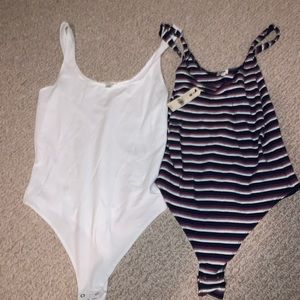 Brand new garage bodysuits both (size m)